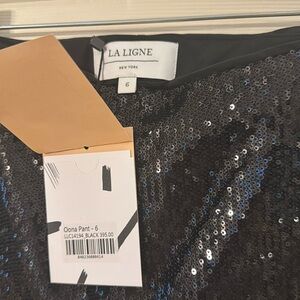 Black sequence pants.